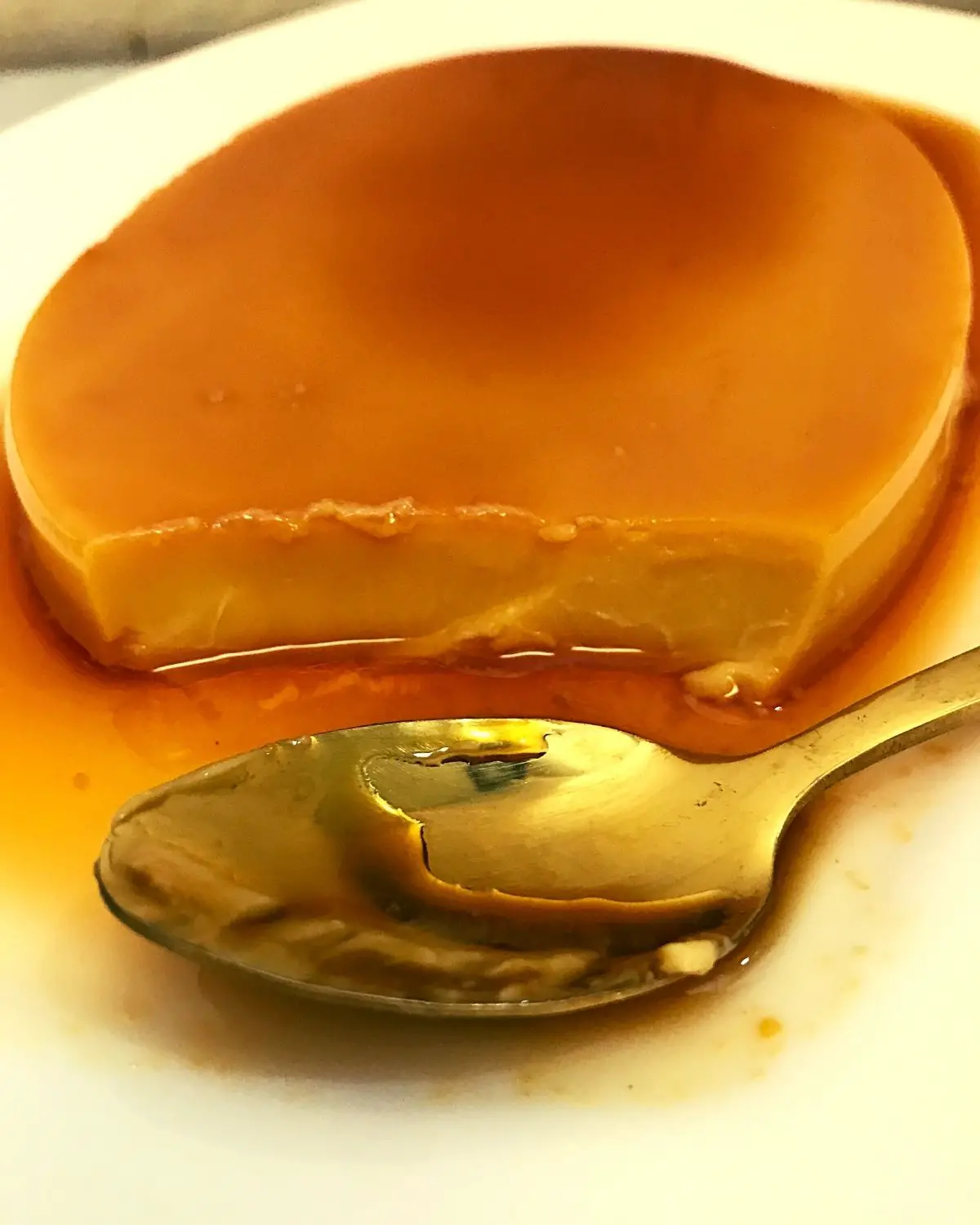 served leche flan in a plate