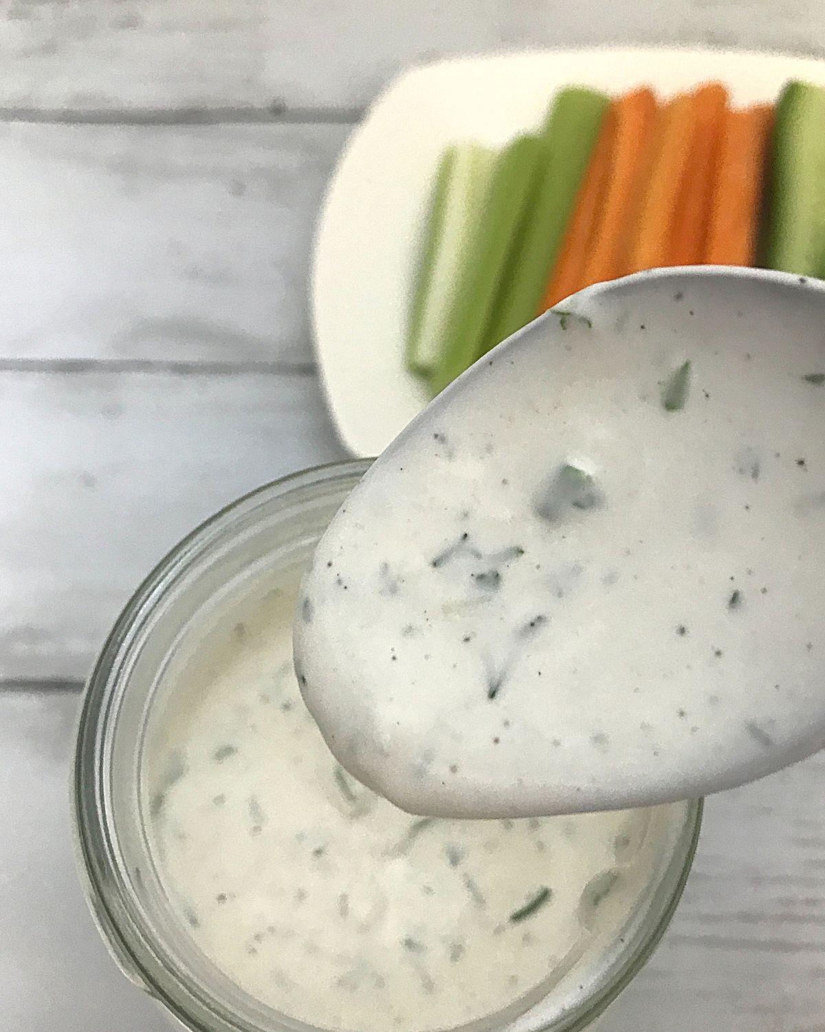 homemade ranch dressing spooned from a jar